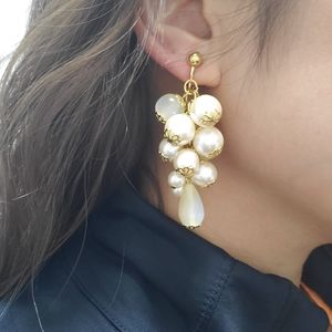 Vintage pearl cluster statement earrings